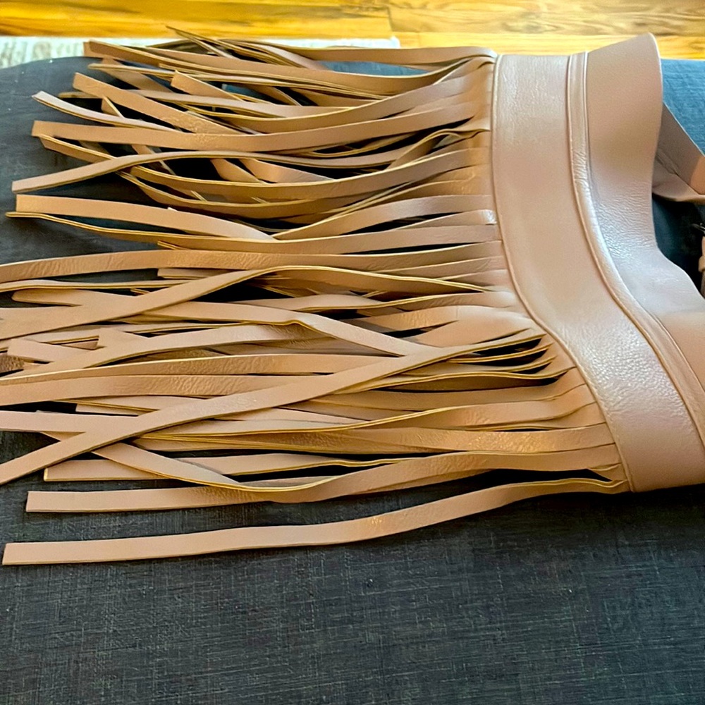 Beautiful Bcbg nude leather belt, goes with skirts and pants